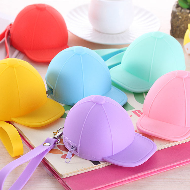 Cute silicone hat coin purse collection in various colors, showcasing playful design and soft silicone material.