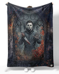 Funny Michael Myers blanket featuring a trapped design with the iconic character holding a knife.