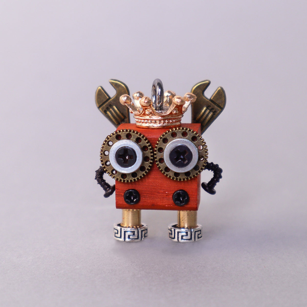Handcrafted Wooden Bot necklace keychain and mini decor showing unique wooden robot designs